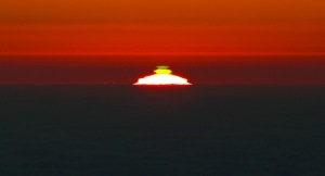 puesta de sol destello verde doble